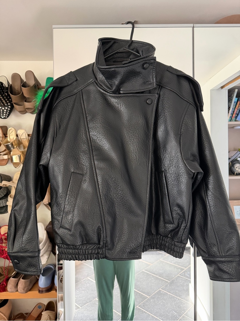 Black woman’s Faux Leather Asymmetric Zip Jacket